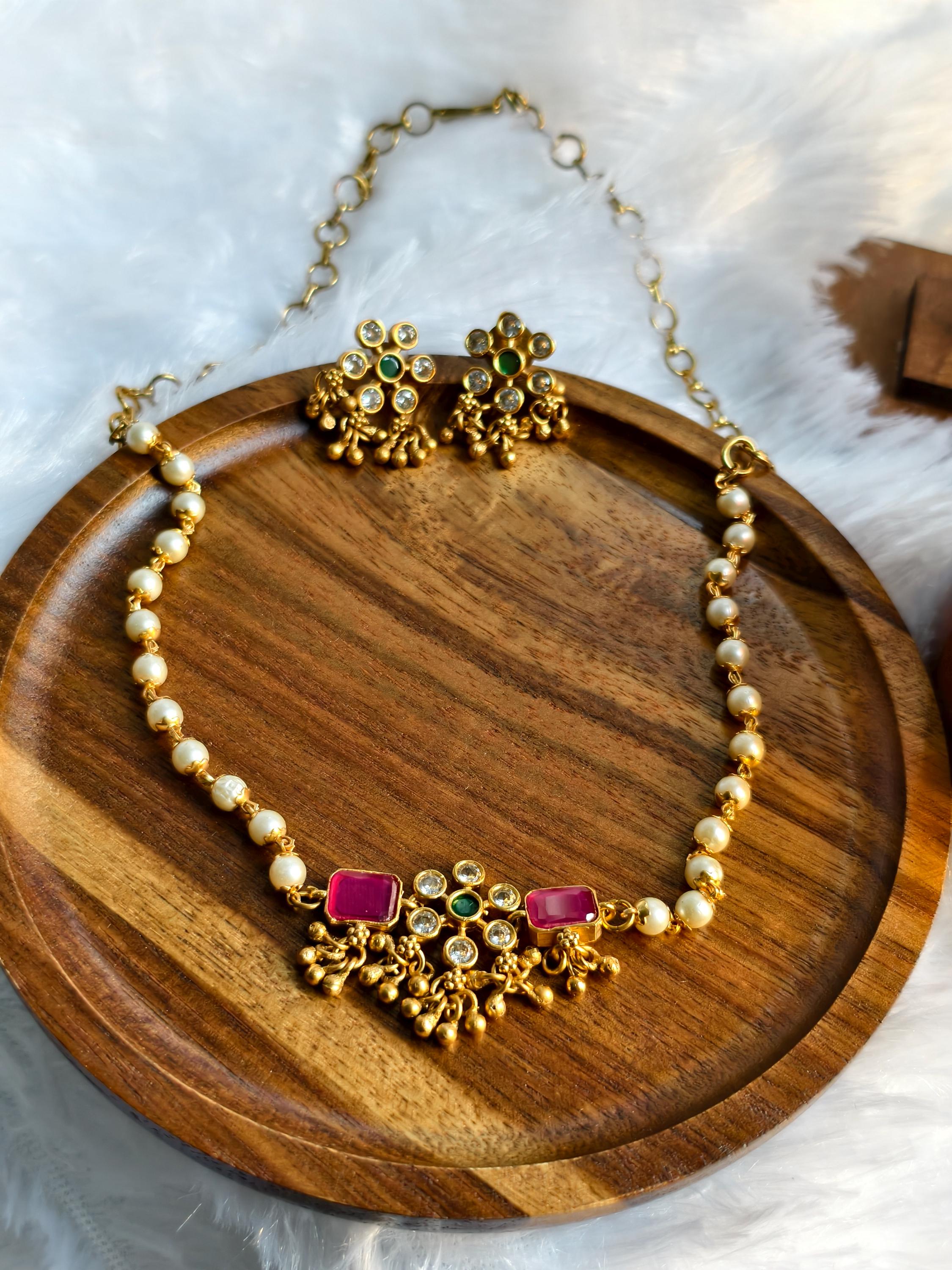 An absolute traditional South Indian Trendy Minimal neckset with Earrings | Pearl Neckset