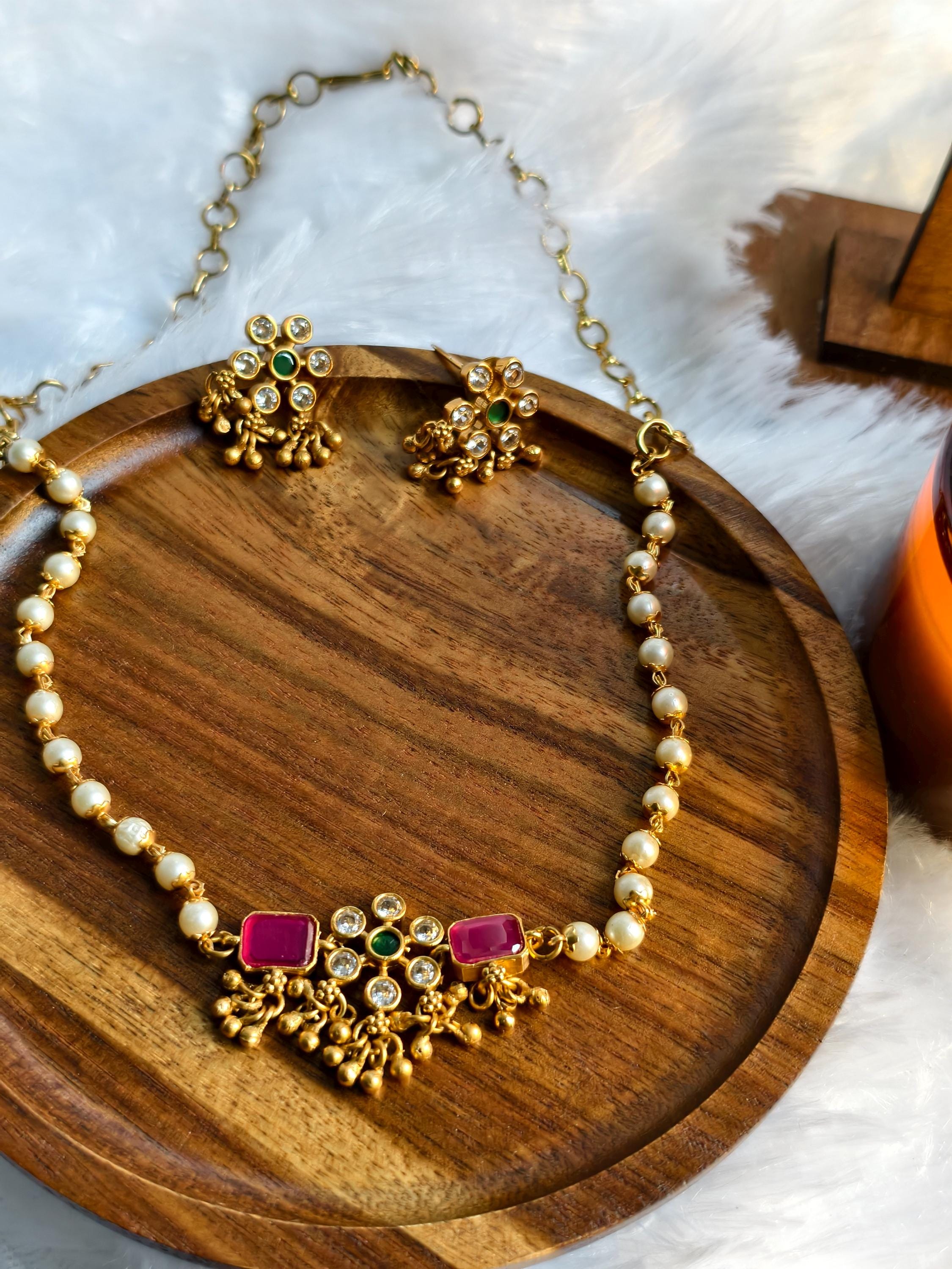 An absolute traditional South Indian Trendy Minimal neckset with Earrings | Pearl Neckset
